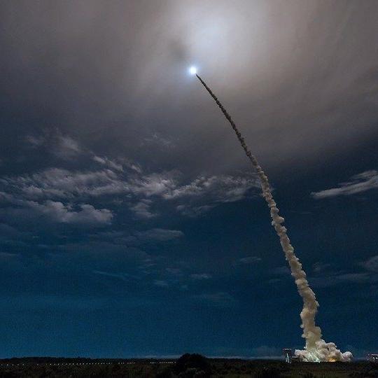 Satellite rocket with space communication technology launching into the air